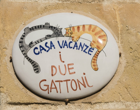 Sign on Vacation Home: Two Fat Cats, Matera