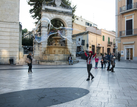Girl Blowing Bubbles, Matera Piazza